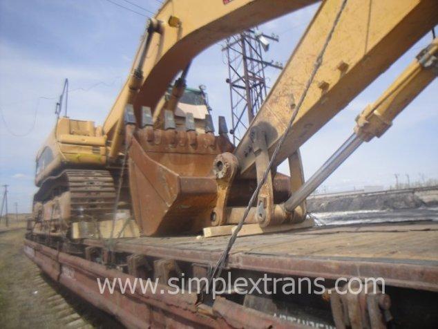 Rail transport of construction and road repair machinery and equipment (excavators, bulldozers, loaders, etc.) - фото 1 - id-p5442959
