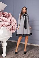 Романтическое свободное платье с большим бантом на горловине и кружевом по подолу