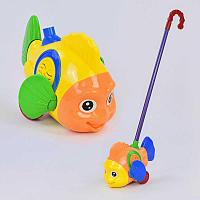 Каталка 0366 (96) "Рыбка" на палочке, с погремушкой, двигает плавниками, в кульке