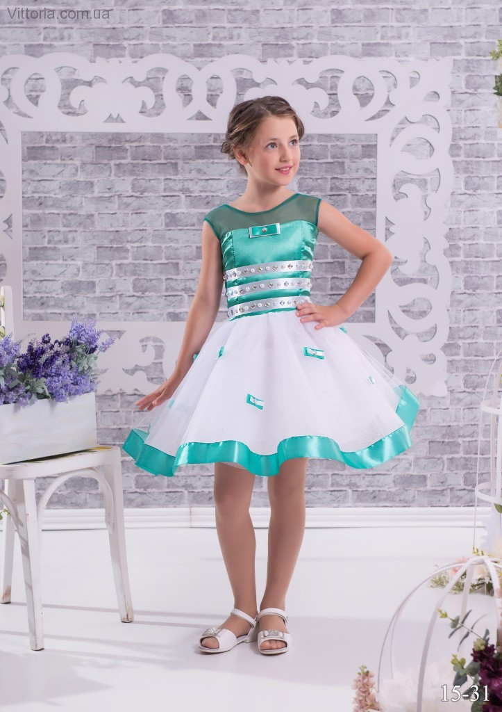Милое детское платье украшенное по юбке бантиками - фото 1 - id-p10125999